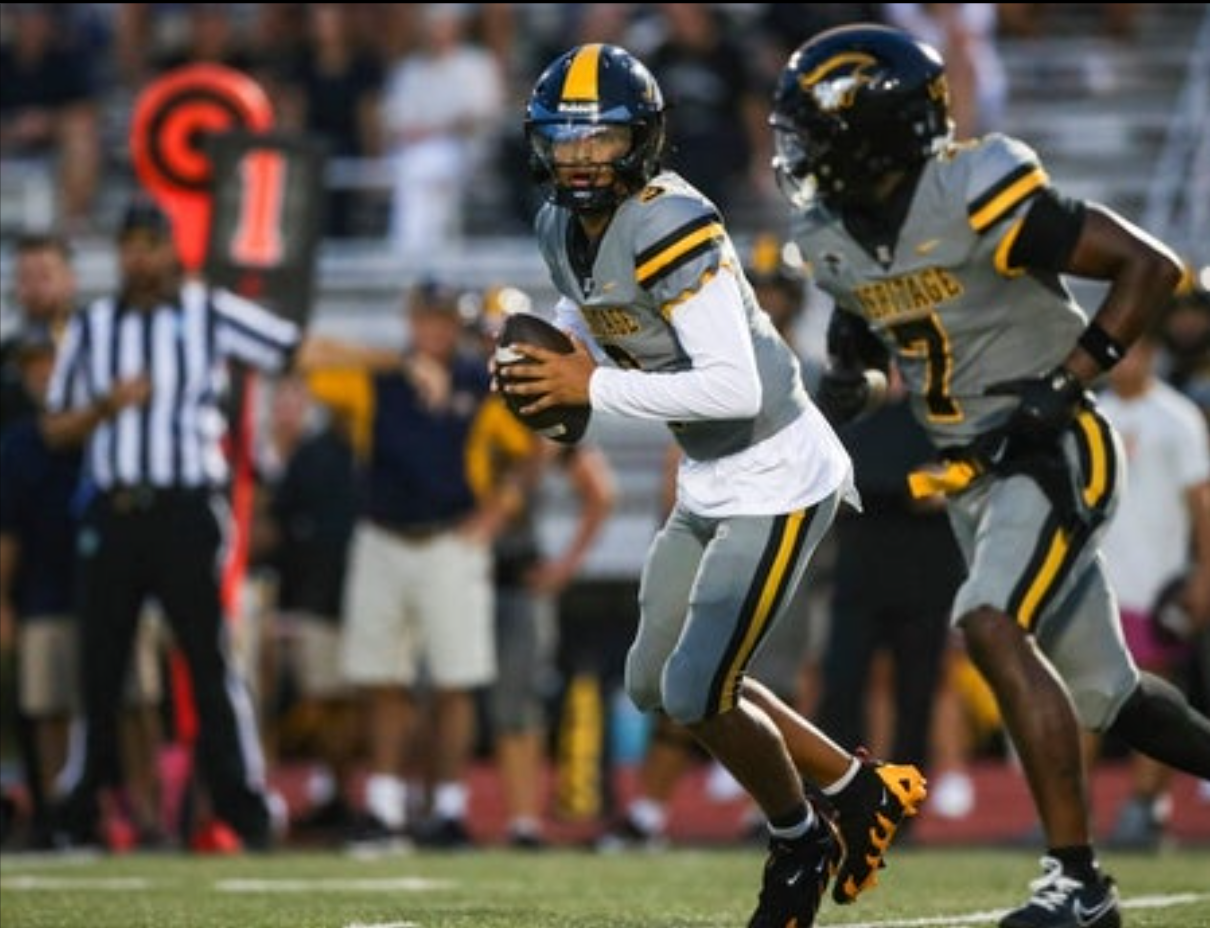 American Heritage Patriots quarterback Dia Bell (3) runs an option play during the first quarter of a game against the Naples Golden Eagles at Staver Field in Naples on Friday, Sept. 13, 2024.